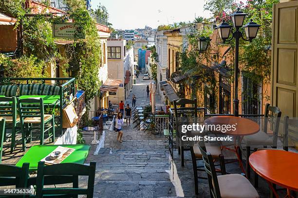 plaka neighborhood in athens, greece - plaka greek cafe stock pictures, royalty-free photos & images