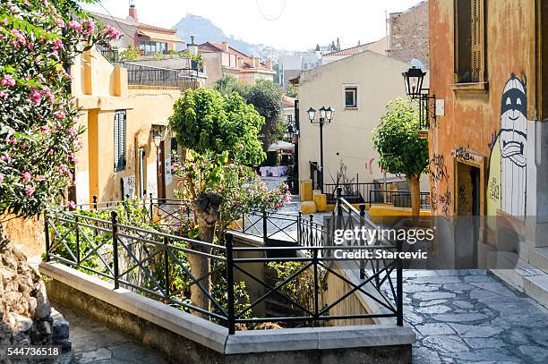 plaka neighborhood in athens, greece - plaka greek cafe stock pictures, royalty-free photos & images