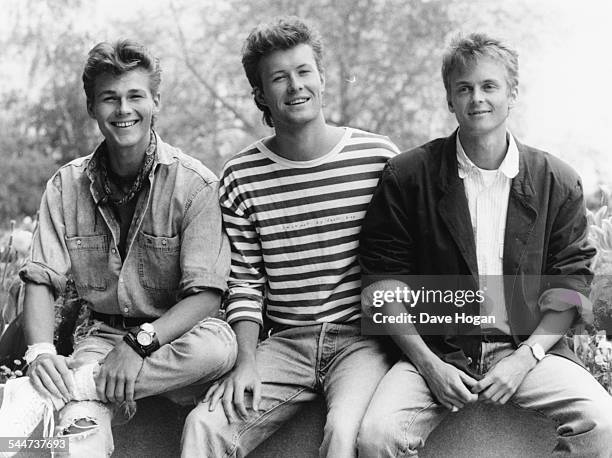 Outdoor portrait of Norweigan pop band 'A-Ha'; Morten Harket, Magne Furuholmen and Paul Waaktaar-Savoy, May 1987.