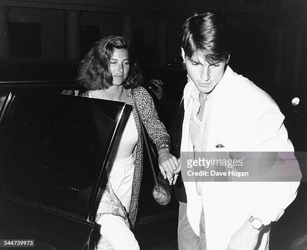 Actors Tom Cruise and Mimi Rogers arriving at a restaurant to dine with pop star Madonna, London, August 19th 1987.