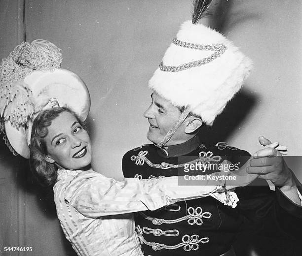 Singers and spouses Marta Egerth and Jan Kiepura in costume as they dance together, as they will appear in the operetta 'The Czardas Princess', at...