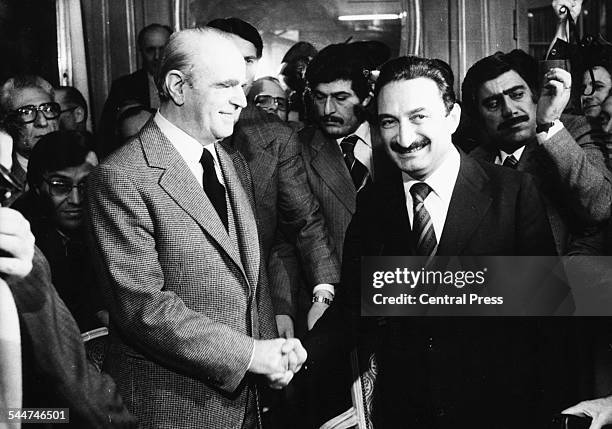 Greek Prime Minister Konstantinos Karamanlis shaking hands with his Turkish counterpart Bulent Ecevit at a meeting in Switzerland, March 13th 1978.