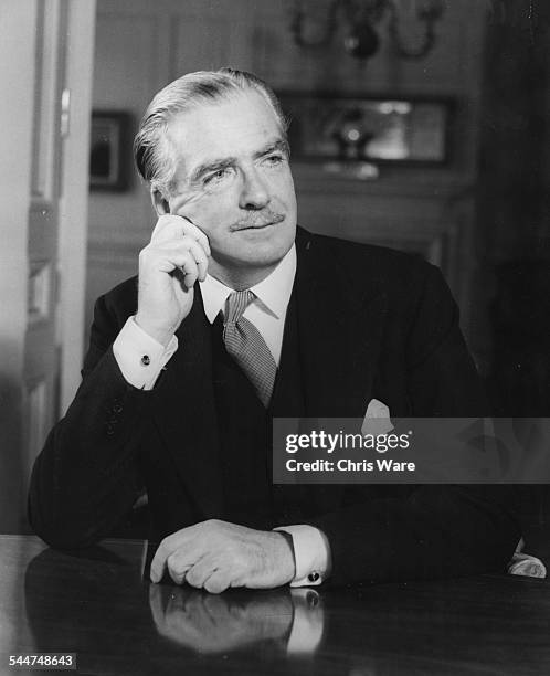 Portrait of Sir Anthony Eden at his desk, on the day he took up the job as Prime Minister, April 1955. Printed at the time of his illness on January...