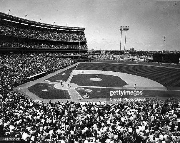 View of spectators at a baseball game in Shea Stadium, New York, New York, 1965.