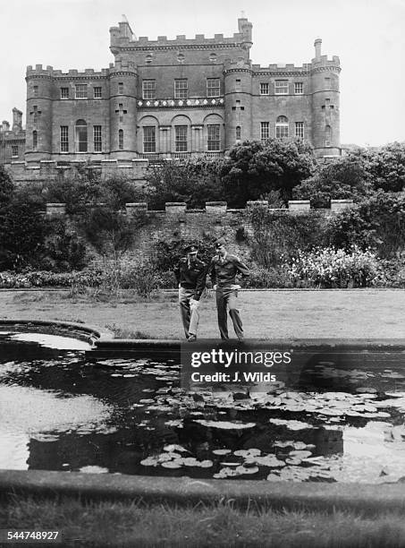 General Dwight Eisenhower with his son, Captain John Eisenhower, in the grounds of Culzean Castle, where he has been presented with a flat, Ayrshire,...