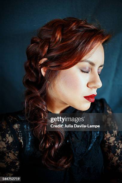 redhead with dutch braid style - black blouse stock pictures, royalty-free photos & images