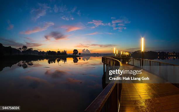 sunrise at lower seletar reservoir - lower seletar reservoir stock pictures, royalty-free photos & images
