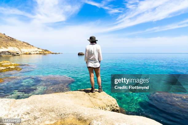 Woman looking over the Mediterranean sea