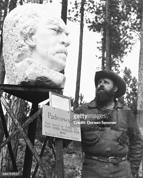 Portrait of American-Polish artist Korczak Ziolkowski with one of his creations; a marble sculpture of Ignacy Jan Paderewski, which won first prize...