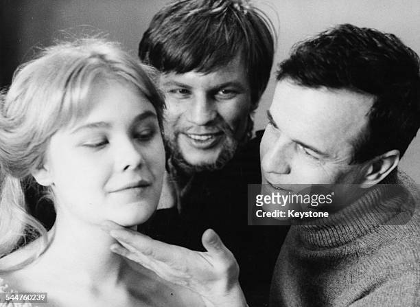 Director Franco Zeffirelli rehearsing with actors Natasha Pyne and Michael York for the film 'The Taming of the Shrew', 1967.