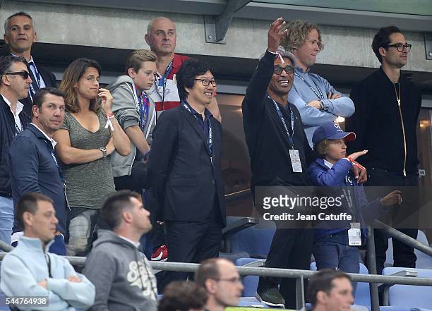 Amelie Mauresmo, Jean-Vincent Place, Yannick Noah and his son Joalukas Noah attend the UEFA Euro 2016 quarter final match between France and Iceland...
