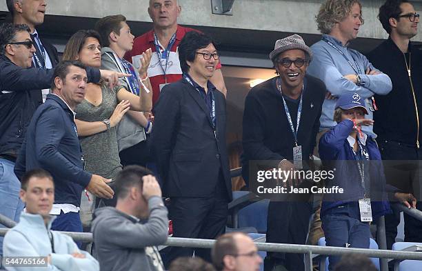 Amelie Mauresmo, Jean-Vincent Place, Yannick Noah and his son Joalukas Noah attend the UEFA Euro 2016 quarter final match between France and Iceland...