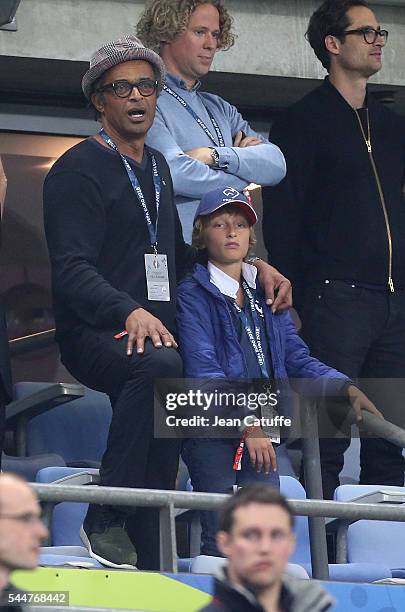 Yannick Noah and his son Joalukas Noah attend the UEFA Euro 2016 quarter final match between France and Iceland at Stade de France on July 3, 2016 in...