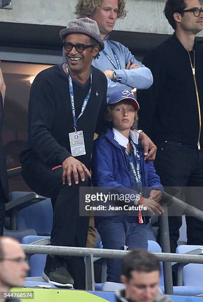 Yannick Noah and his son Joalukas Noah attend the UEFA Euro 2016 quarter final match between France and Iceland at Stade de France on July 3, 2016 in...