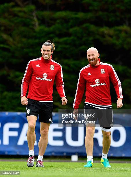 Wales player Gareth Bale and James Collins share a joke during Wales training ahead of their UEFA Euro 2016 semi final against Portugal at College Le...