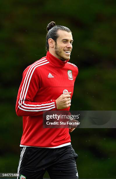 Wales player Gareth Bale warms up during Wales training ahead of their UEFA Euro 2016 semi final against Portugal at College Le Bocage on July 4,...
