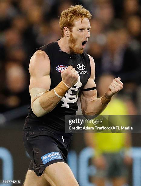 Andrew Phillips of the Blues celebrates a goal during the 2016 AFL Round 15 match between the Carlton Blues and the Collingwood Magpies at the...