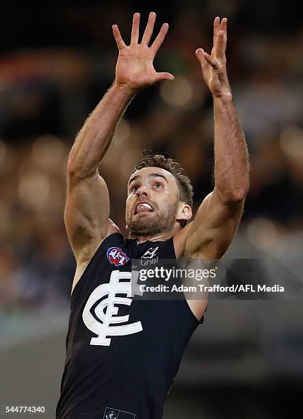 Andrew Walker of the Blues attempts to mark in his 200th game during the 2016 AFL Round 15 match between the Carlton Blues and the Collingwood...