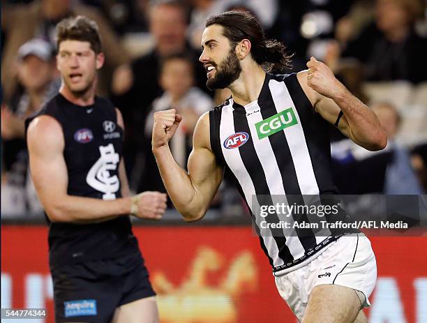 Brodie Grundy of the Magpies celebrates a goal during the 2016 AFL Round 15 match between the Carlton Blues and the Collingwood Magpies at the...