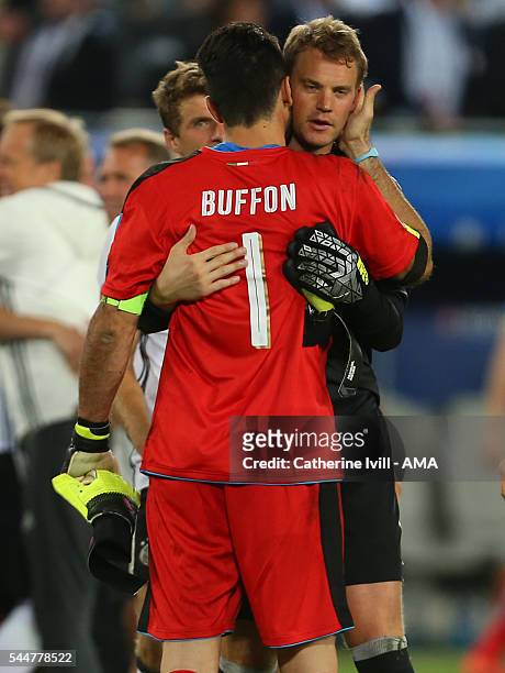 Manuel Neuer of Germany hugs Italy goalkeeper Gianluigi Buffon after the UEFA Euro 2016 quarter final match between Germany and Italy at Stade Matmut...
