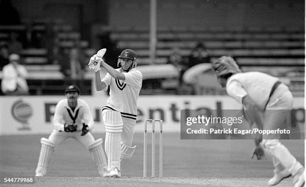 Duncan Fletcher of Zimbabwe hits a delivery from Jeff Thomson of Australia during his innings of 69 runs in the Prudential World Cup group match...