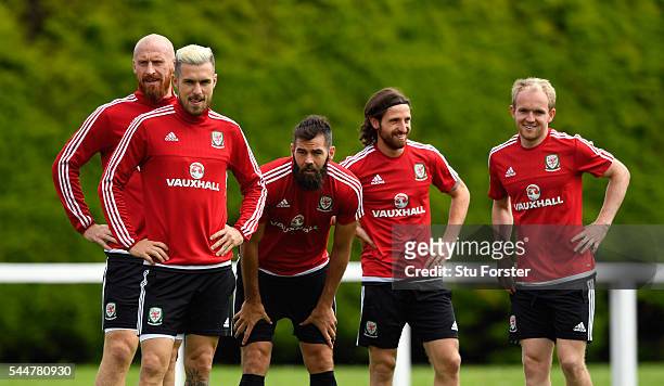 Wales players from left to right James Collins, Aaron Ramsey, Joe Ledley, Joe Allen and Jonny Williams share a joke during Wales training ahead of...