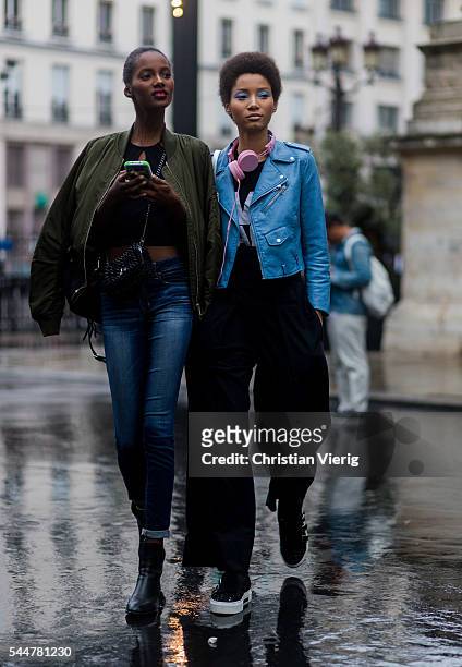 Model Tami Williams and Lineisy Montero outside Versace during Paris Fashion Week Haute Couture F/W 2016/2017 on July 3, 2016 in Paris, France.