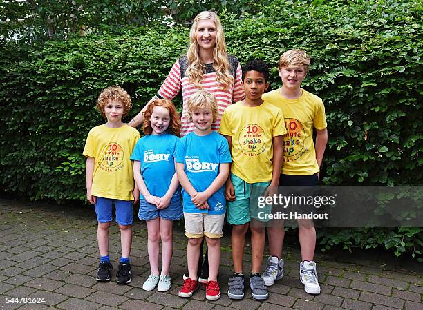 In this handout supplied by Disney, Rebecca Adlington films at the Manchester Aquatic Centre for a new campaign from Disney, Change4Life and the...