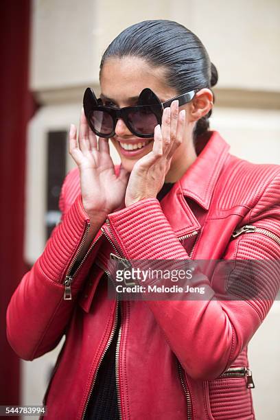Model Sara Sampaio wears cat-eye sunglasses at the Francesco Scognamiglio show on July 3, 2016 in Paris, France.