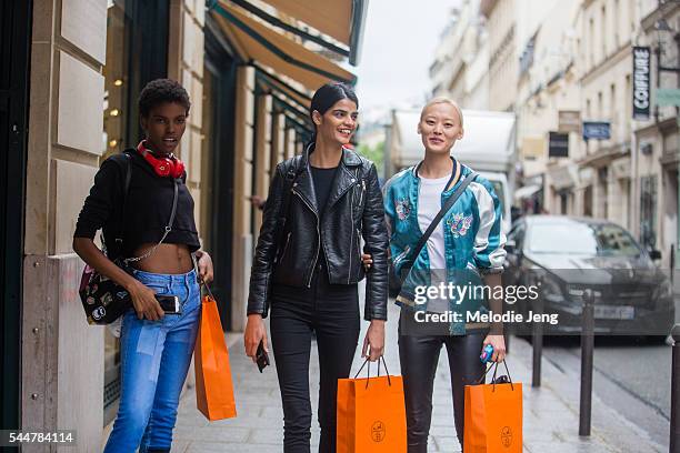 Models Amilna Estevao, Bhumika Arora, Li Xiao Xing at the Hermes presentation on July 3, 2016 in Paris, France.