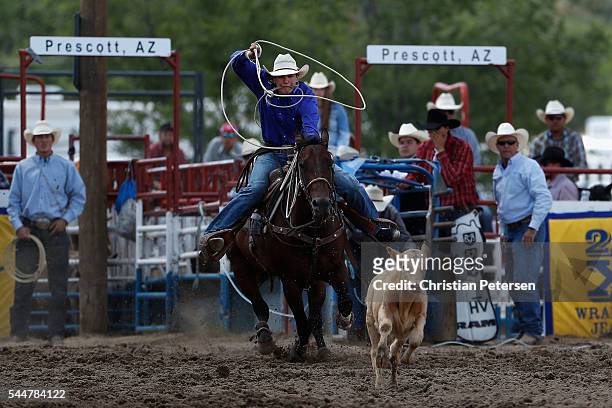 Cooper Martin of Alma, KS competes in tie down roping at the Prescott Frontier Days "World's Oldest Rodeo" on July 2, 2016 in Prescott, Arizona.