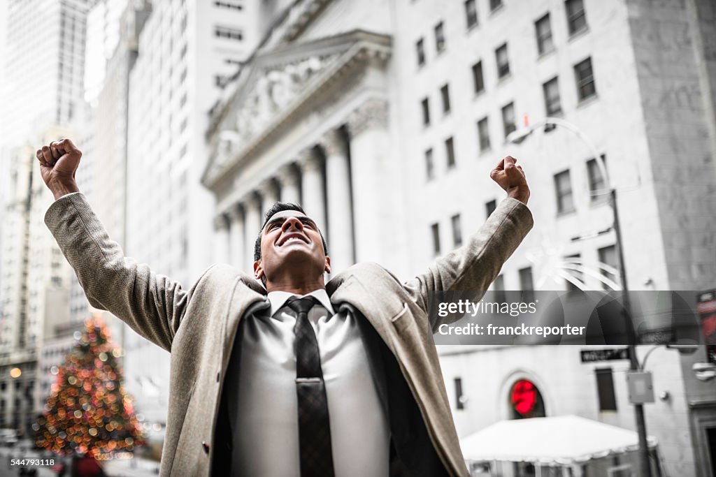 Successful business man with thumbs up