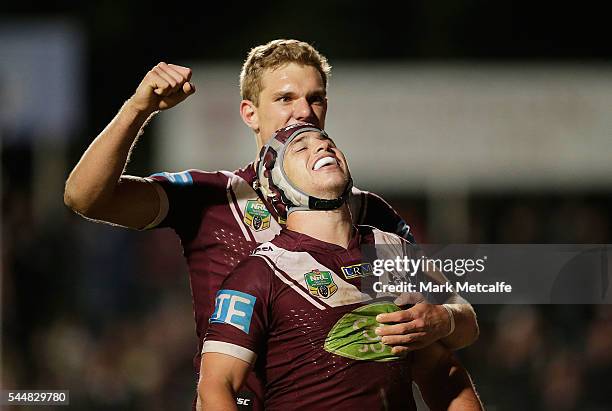 Jamie Buhrer of the Sea Eagles celebrates scoring a try with team mate Tom Trbojevic during the round 17 NRL match between the Manly Sea Eagles and...