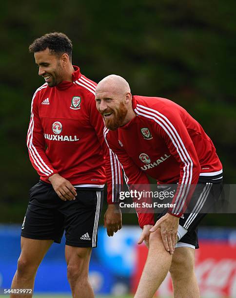 Wales players Hal Robson-Kanu and James Collins share a joke during Wales training ahead of their UEFA Euro 2016 semi final against Portugal at...