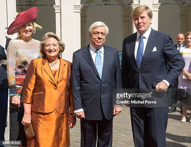 Queen Maxima of The Netherlands, Vlasia Pavlopoulou, Greek President Prokopis Pavlopoulos and King Willem-Alexander pose for a photo upon arrival at...