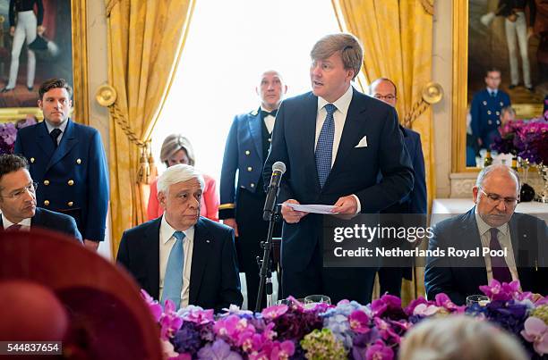 King Willem-Alexander gives a speech during a lunch for visiting Greek President Prokopis Pavlopoulos and his wife Vlasia Pavlopoulou at the...