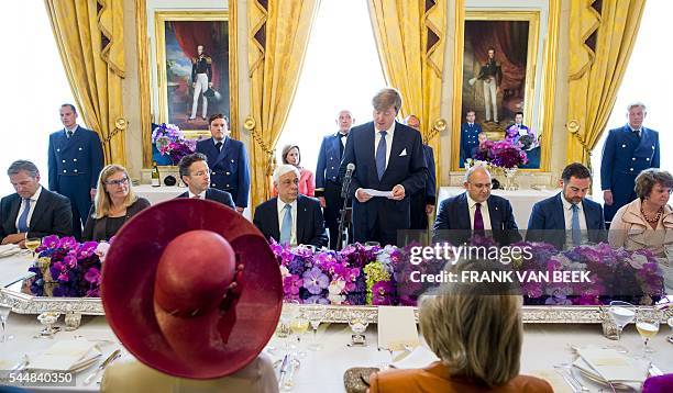 Dutch Finance Minister Jeroen Dijsselbloem , Greek President Prokopis Pavlopoulos and King Willem-Alexander attend a lunch at the Palace Noordeinde...