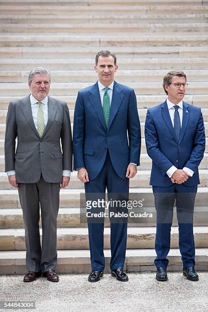 Inigo Mendez de Vigo, King Felipe VI of Spain and Alberto Nunez Feijoo attend "CJC 2016 El Centenario De Un Nobel" Exhibition at the National Library...