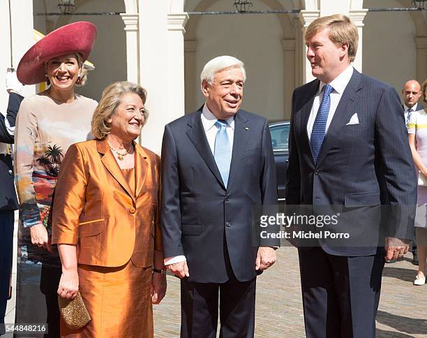 Queen Maxima of The Netherlands, Vlasia Pavlopoulou, Greek President Prokopis Pavlopoulos and King Willem-Alexander pose for a photo upon arrival at...