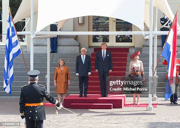 Vlasia Pavlopoulou, Greek President Prokopis Pavlopoulos, King Willem-Alexander and Queen Maxima of The Netherlands listen to the Greek national...