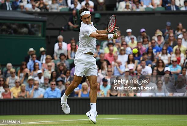 Roger Federer of Switzerland plays a forehand during the Men's Singles fourth round match against Steve Johnson of The United States on day seven of...