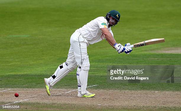 Michael Lumb of Nottinghamshire plays the ball of his legs during the Specsavers County Championship division one match between Nottinghamshire and...