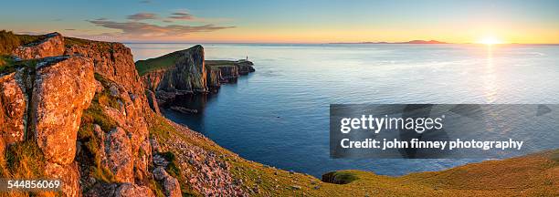 neist point sunset, isle of skye, scotland. - isle of skye stock pictures, royalty-free photos & images