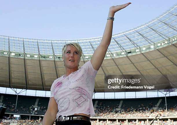 Astrid Kumbernuss of Germany acknowledges the crowd as she finishes her career after the Golden League ISTAF 2005 at the Olympic Stadium on September...