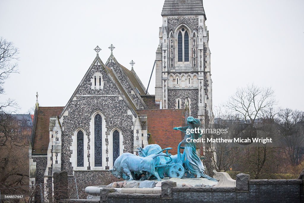 A fountain statue sits outside St. Albans church