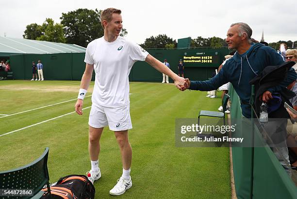 Jonathan Marray of Great Britain celebrates victory during the Men's Doubles first round match against Pablo Cuevas of Uraguay and Marcel Granollers...