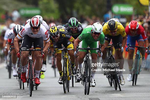 Mark Cavendish of Great Britain and Team Dimension Data sprints for the finishing line to claim the stage win from Andre Greipel of Germany and Lotto...