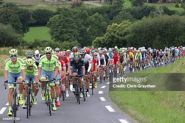 The peloton rides through the countryside during stage three of the 2016 Le Tour de France a 223.5km stage from Granville to Angers on July 4, 2016...