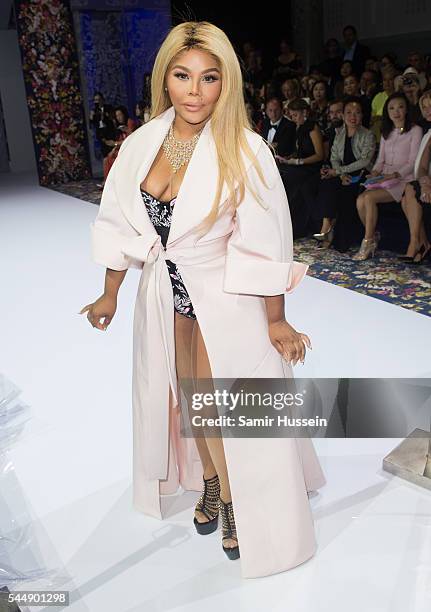 Lil' Kim attends the Ralph & Russo Haute Couture Fall/Winter 2016-2017 show as part of Paris Fashion Week on July 4, 2016 in Paris, France.