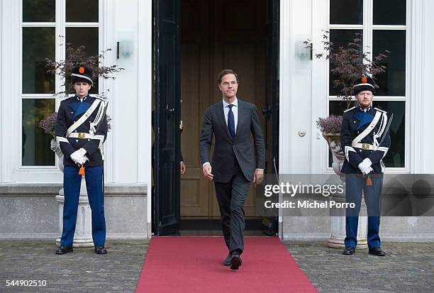 Dutch Prime Minister Mark Rutte waits for Greek President Prokopis Pavlopoulos at the Catshuis during a two-day visit on July 4, 2016 in The Hague,...